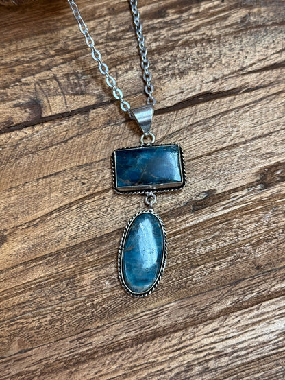 Lariat necklace with silver chain and blue rectangle plus oval stone pendants