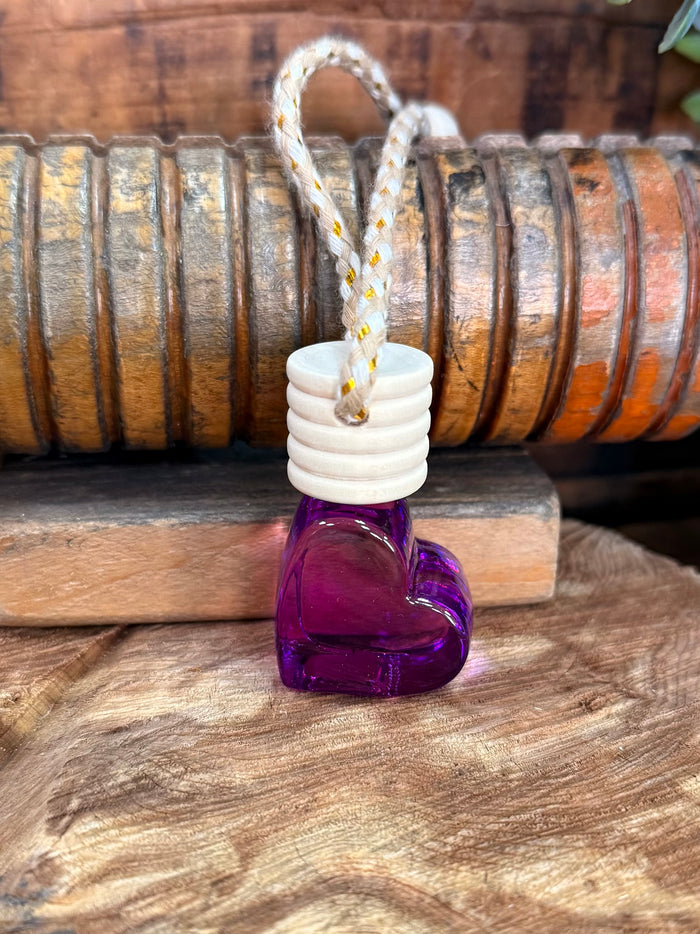 Heart-shaped scent diffuser with purple glass and braided hanging loop
