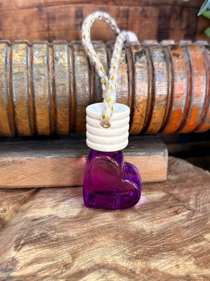 Heart-shaped scent diffuser with purple glass and braided hanging loop