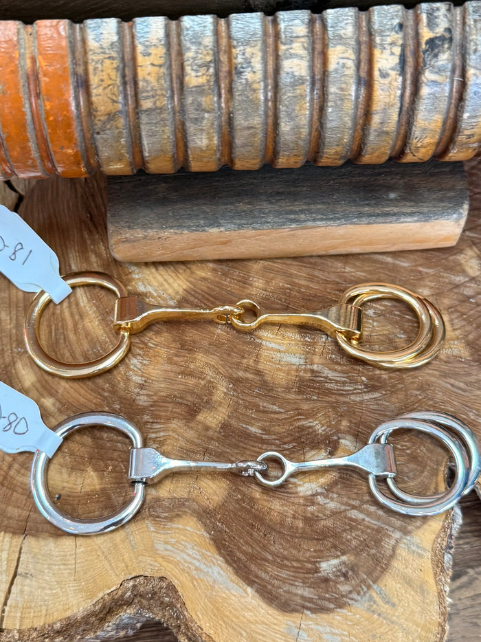 Snaffle bit scarf slide with linked rings, gold and silver metal tones