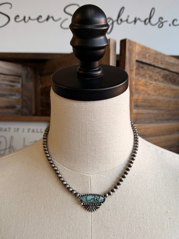 Turquoise chunk necklace with silver-tone bead chain and small oval turquoise center pendant