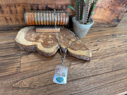 Turquoise roper-style necklace with silver chain and rectangular world map pendant