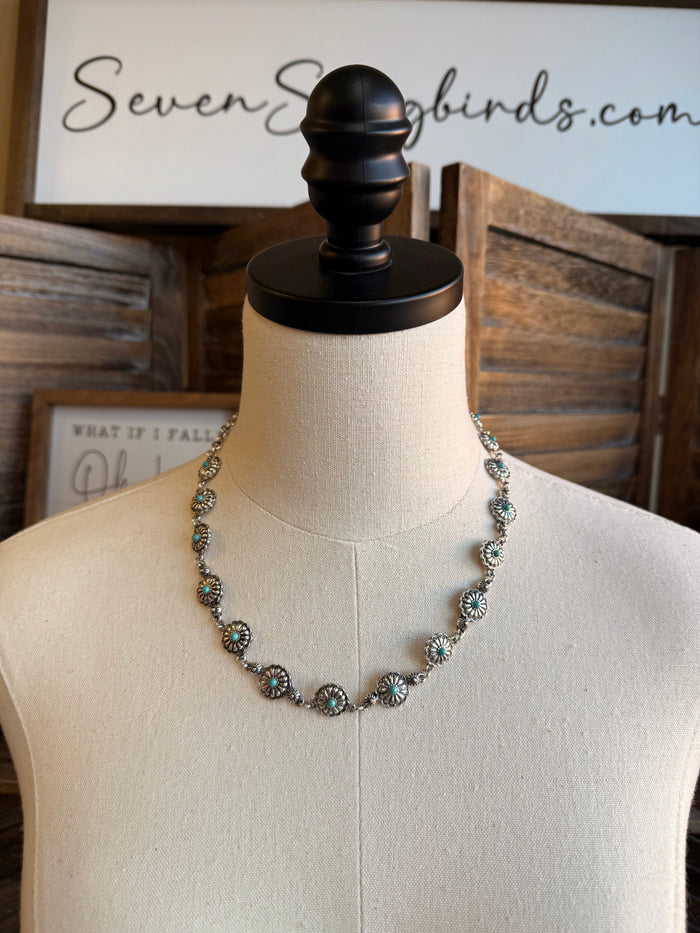 Silver-toned concho necklace with turquoise stone accents