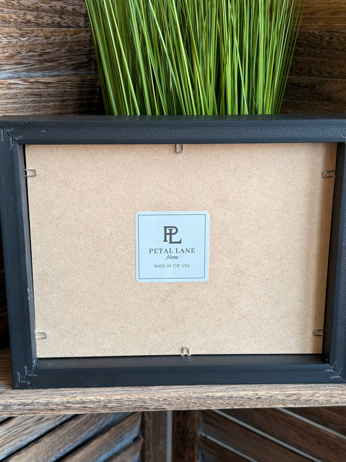 Wood-framed artwork back with Petal Lane label and hanging hooks
