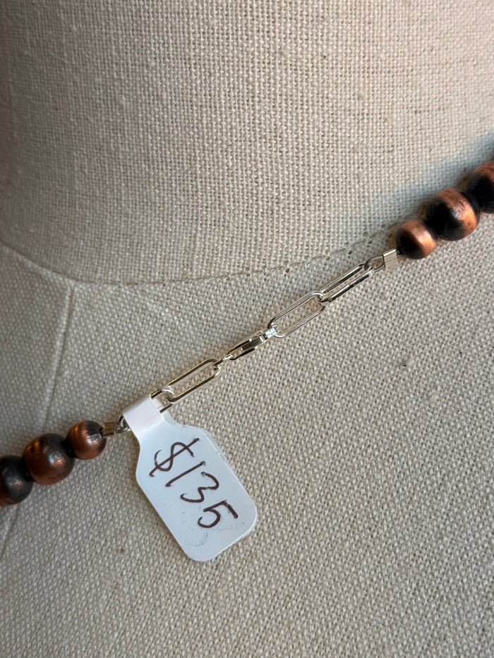 Copper bead necklace with clasp and hang tag