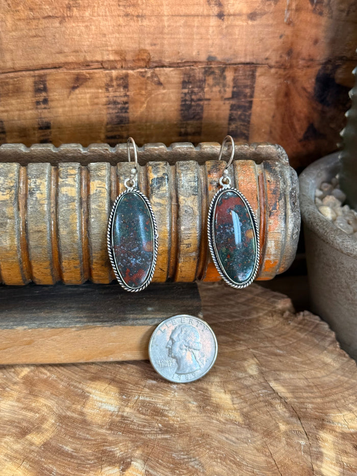 Oval red-blue stone fishhook earrings in silver-tone settings