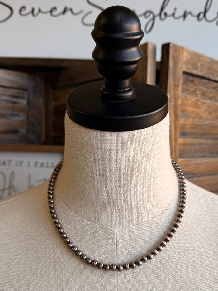 18-inch 6mm silver-tone beaded necklace on mannequin, double-strand look
