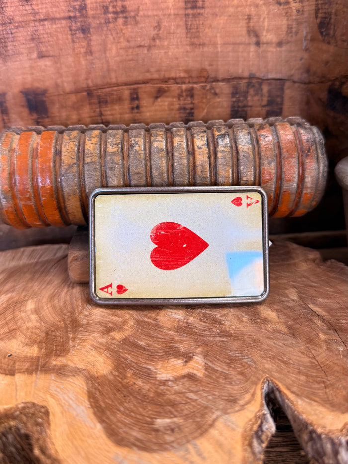 Ace of hearts playing-card belt buckle with red heart on light background