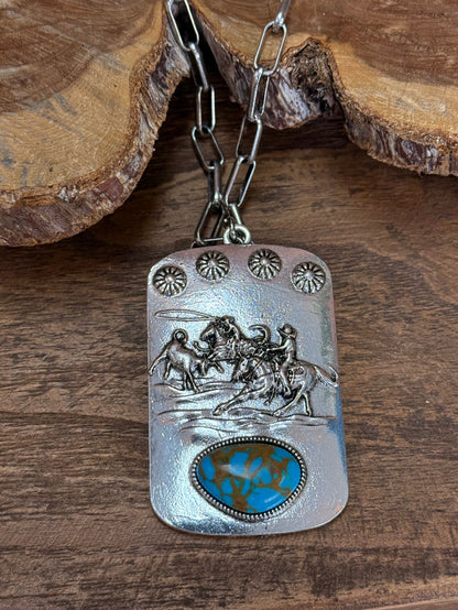 Roping scene pendant necklace with studded top and turquoise-style oval