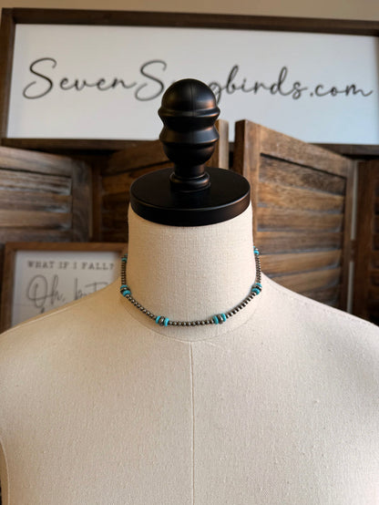 12-inch turquoise and silver bead necklace on mannequin bust