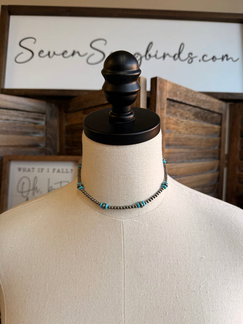 12-inch turquoise and silver bead necklace on mannequin bust