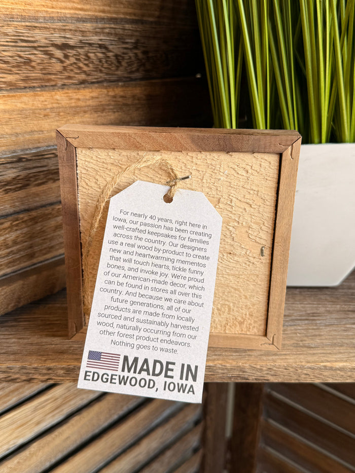 4x4 wooden framed artwork back with poem and “MADE IN EDGEWOOD, IOWA” label
