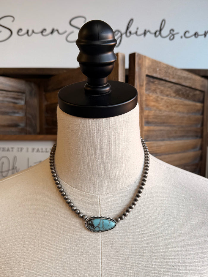 Turquoise chunk necklace with silver-tone bead chain and a single oval turquoise pendant