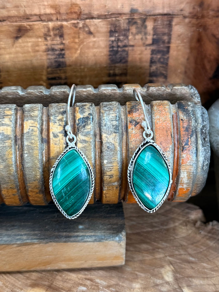 Malachite fishhook earrings with oval teal cabochons and silver-tone frames