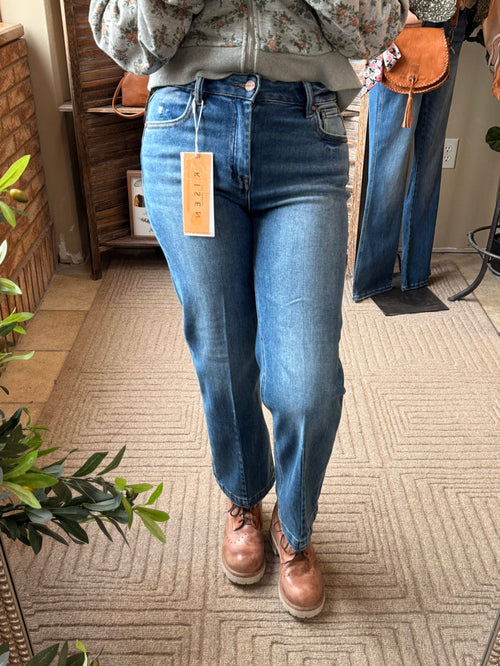Cropped tapered boyfriend jeans in dark blue wash denim, button waist, stitched seams