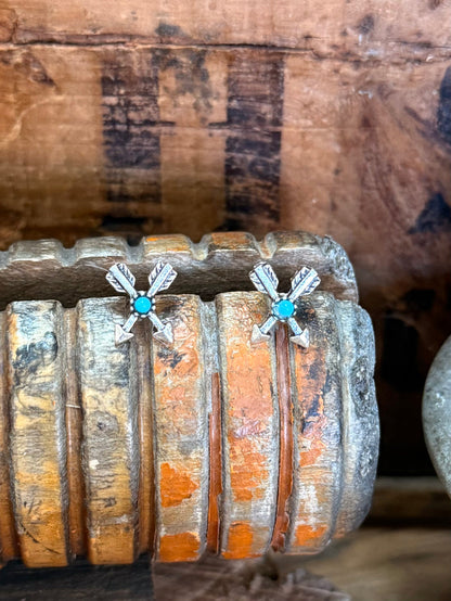Silver arrow stud earrings with turquoise cabochon stones