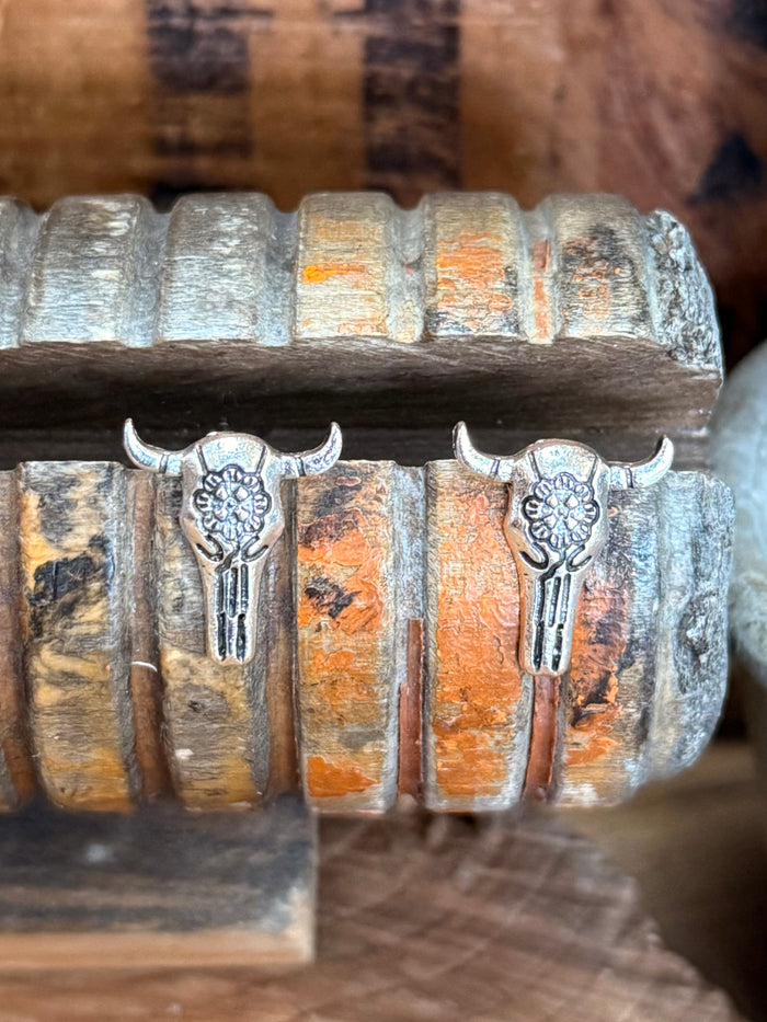 Pair of silver-tone cow skull stud earrings