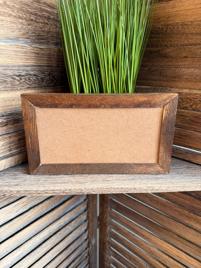 Rustic wood frame with blank beige mat panel