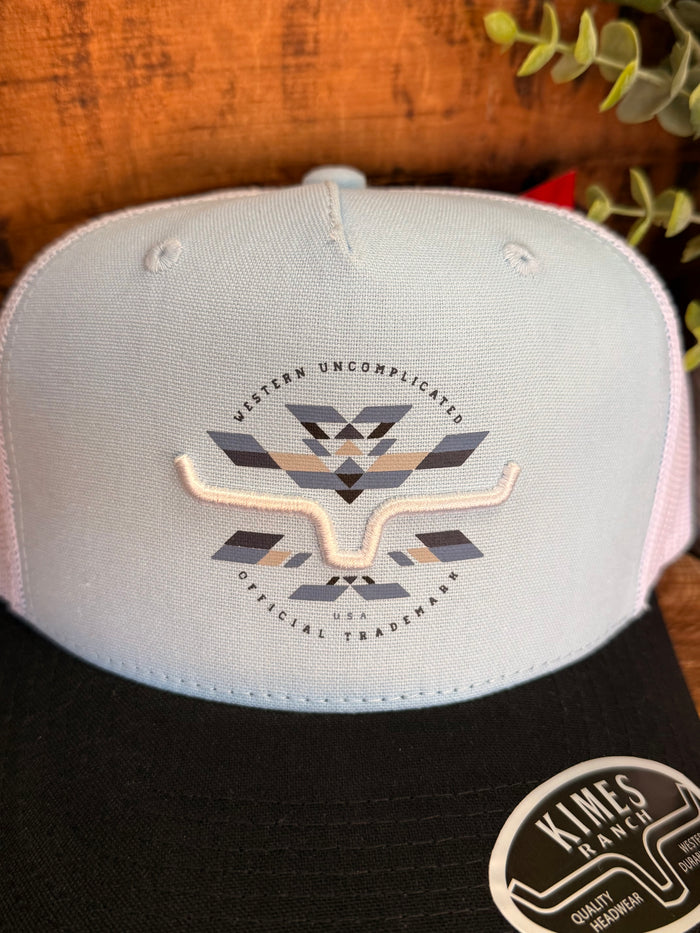 Light blue cap with large western logo embroidery and black brim with Kimes patch