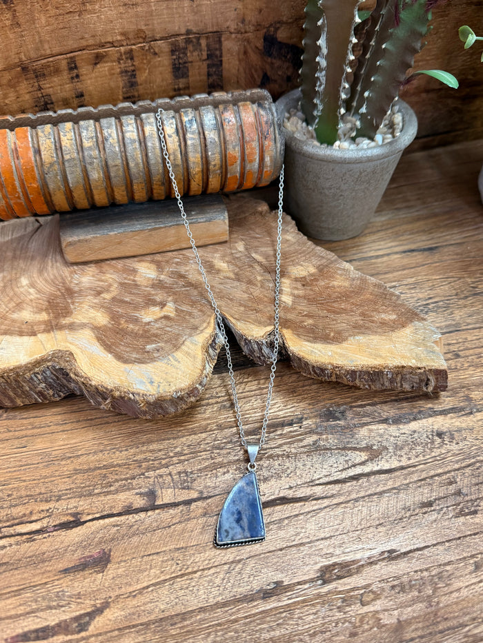 Silver chain necklace with blue triangular stone pendant
