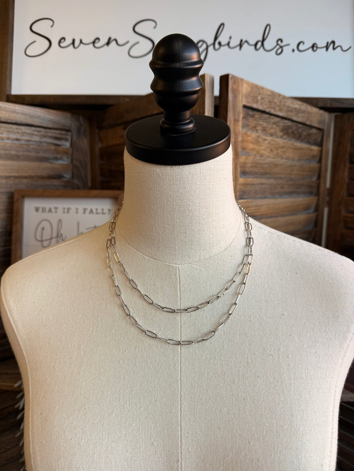 16 in silver double-layer chain necklace on display bust