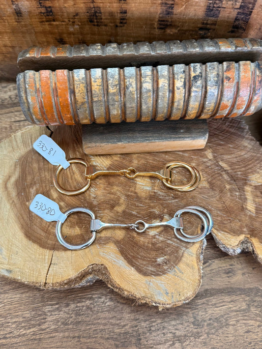 Metal scarf slide with snaffle bit and linked rings, silver and gold finish