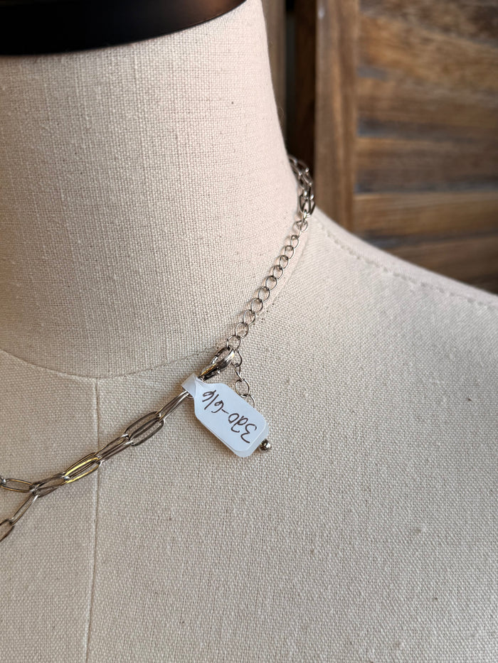 Silver double-layer chain necklace with small engraved charm tag