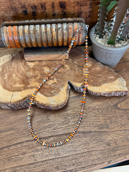 21-inch orange spiny oyster chip necklace with sterling silver beads, beaded strand
