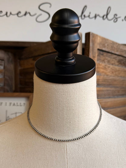 Silver-tone 3mm ball chain choker necklace on mannequin neck