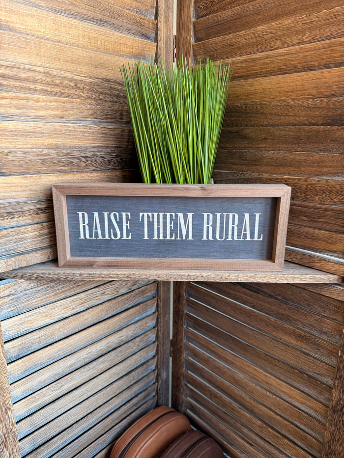 Framed 12x4 farmhouse artwork with 'RAISE THEM RURAL' text and wood frame
