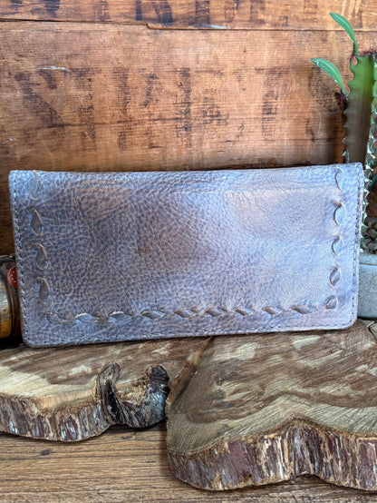 Gray cowhide checkbook wallet, long pebble leather with stitched perimeter