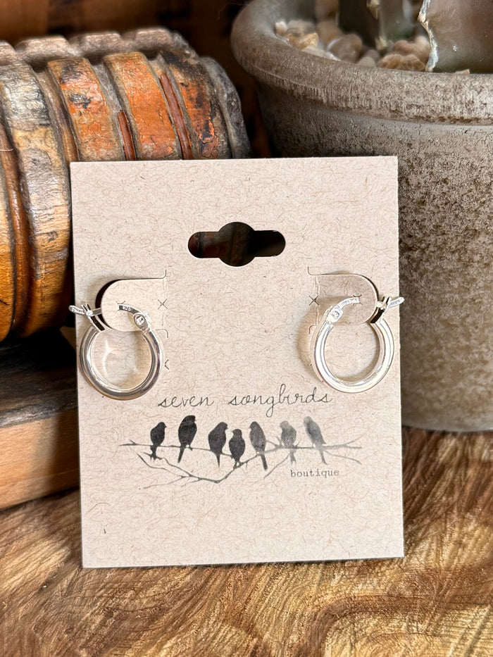 Sterling silver squared-off hoop earrings with circular hinge on card
