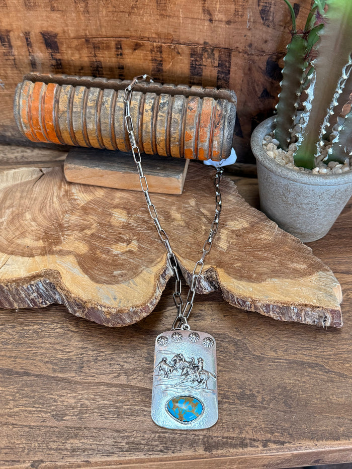 Silver-tone roping pendant necklace with turquoise-style oval and chain