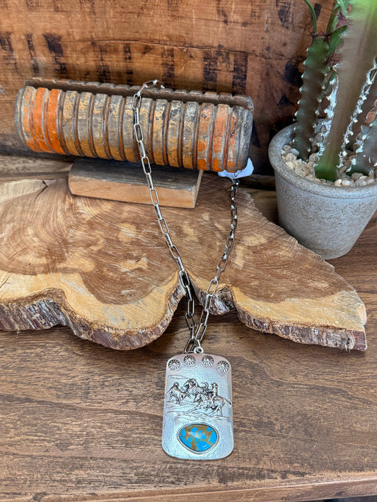 Silver-tone roping pendant necklace with turquoise-style oval and chain