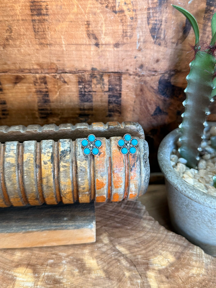 Silver stud earrings with turquoise floral cluster accents
