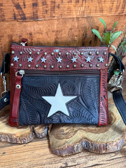 Star-spangled leather crossbody purse with top zipper and silver hardware
