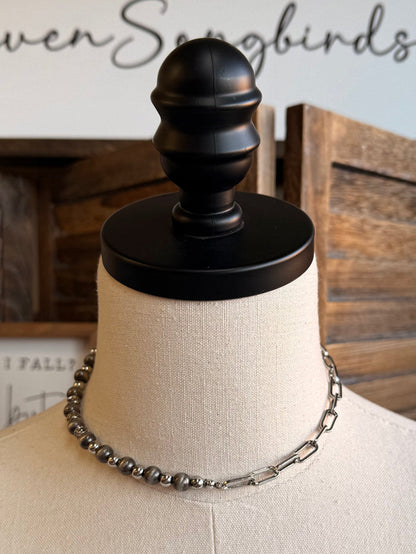 Silver chain with pearl bead strand necklace, layered around mannequin neck