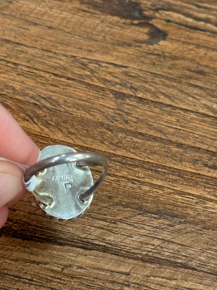 Sterling silver ring interior stamp with maker mark and size markings