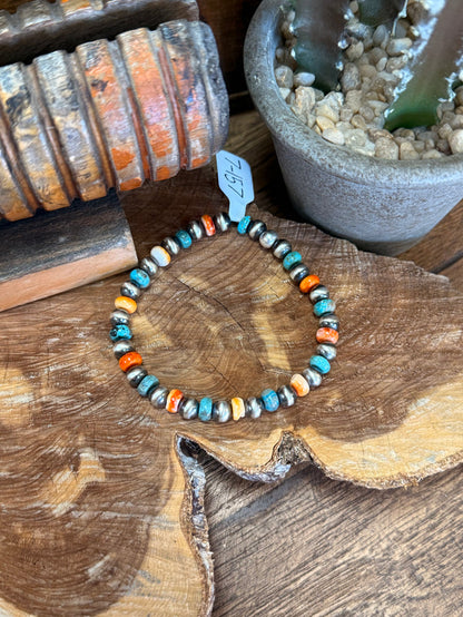 Turquoise beaded bracelet with orange spiny oyster inlays and white shell pearls