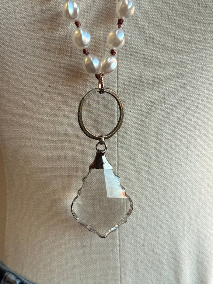Brass ring pendant necklace with faceted crystal charm and pearl-like bead accents