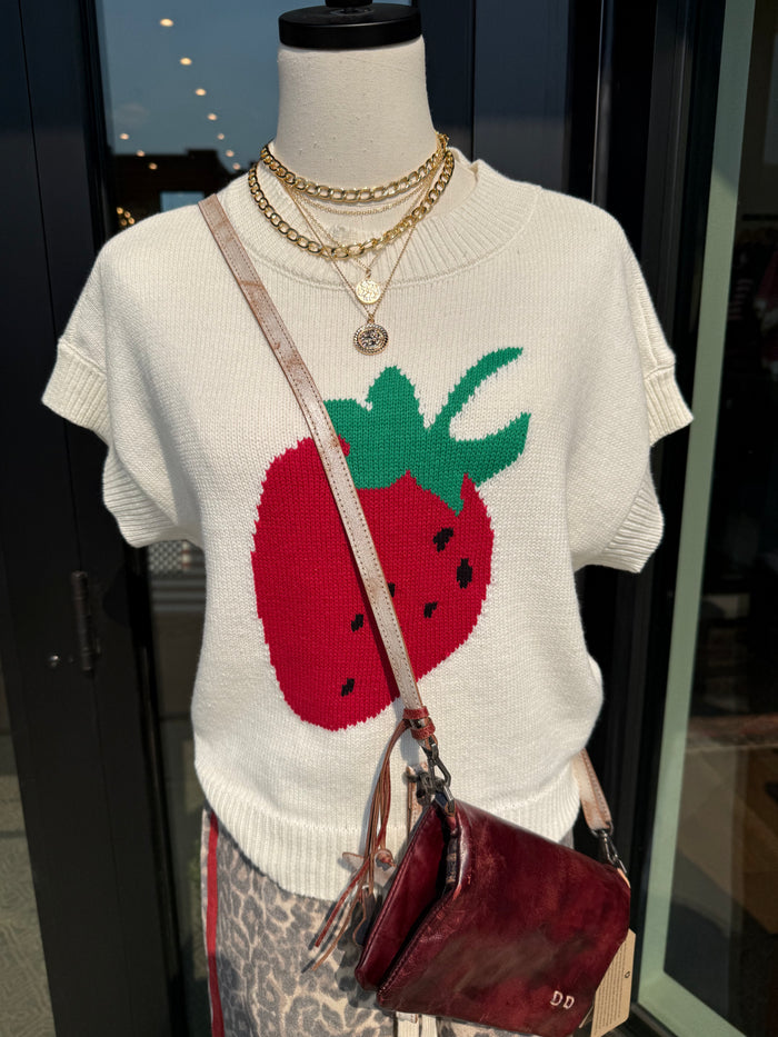 Cream short-sleeve sweater with crew neck and red strawberry knit design with green