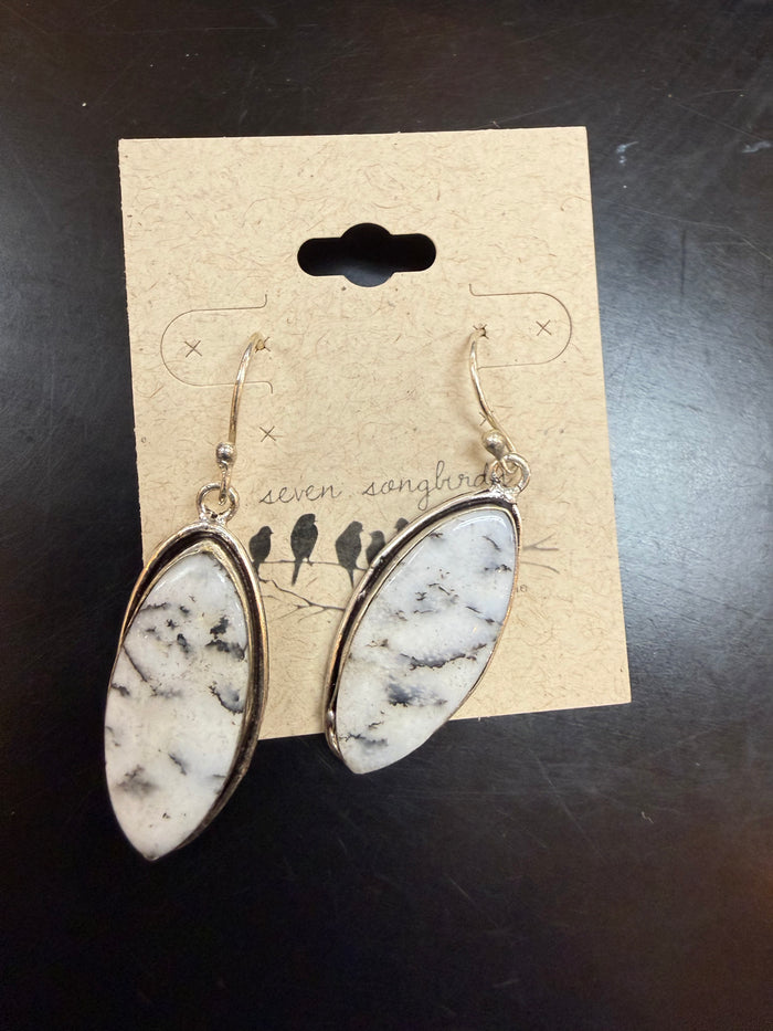 Oval dendritic opal fishhook earrings, silver-tone settings, dangling white with black specks