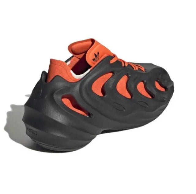 Adidas Adifom Q sneaker: black with orange heel collar and flame cutout panels