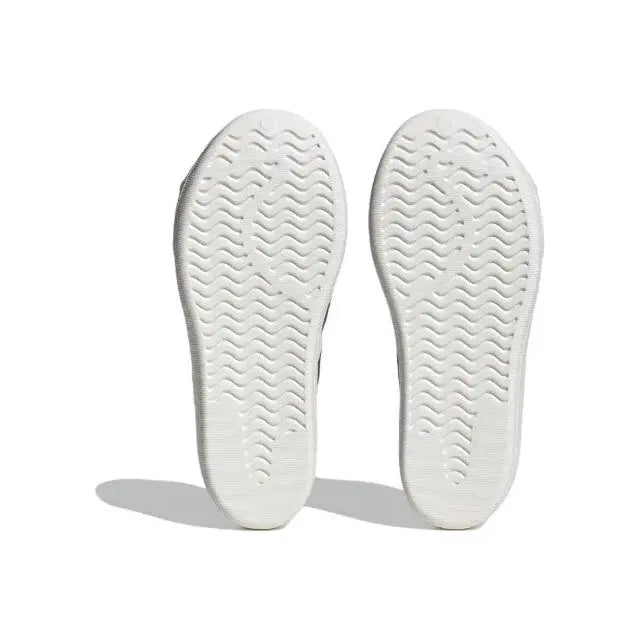 White sneaker outsole with wavy textured tread