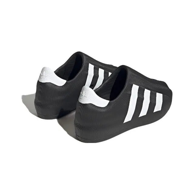 Adidas Adifom black slip-on sneakers with white heel lining and stripes