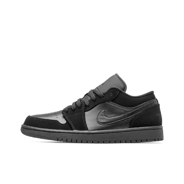 Air Jordan 1 low-top sneakers in black with lace-up closure and Swoosh logo