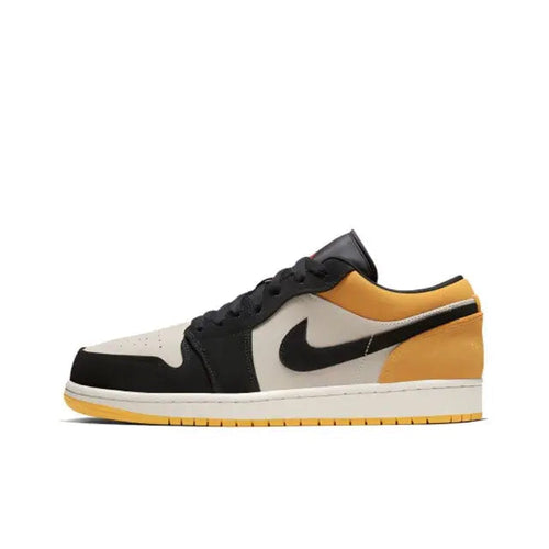 Air Jordan 1 low-top sneakers in black, sail, and gold with Nike swoosh