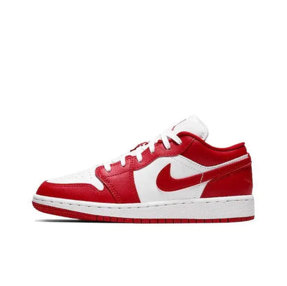 Low-top sneaker with red leather, white panels, and Nike Swoosh