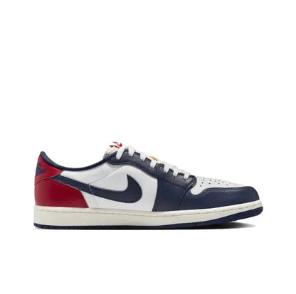 Jordan 1 low-top sneakers in navy, white, and red with lace-up front