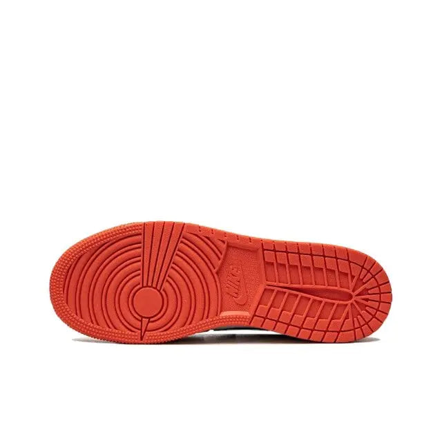 Nike Air Jordan 1 outsole with orange rubber tread and circular pivot pattern